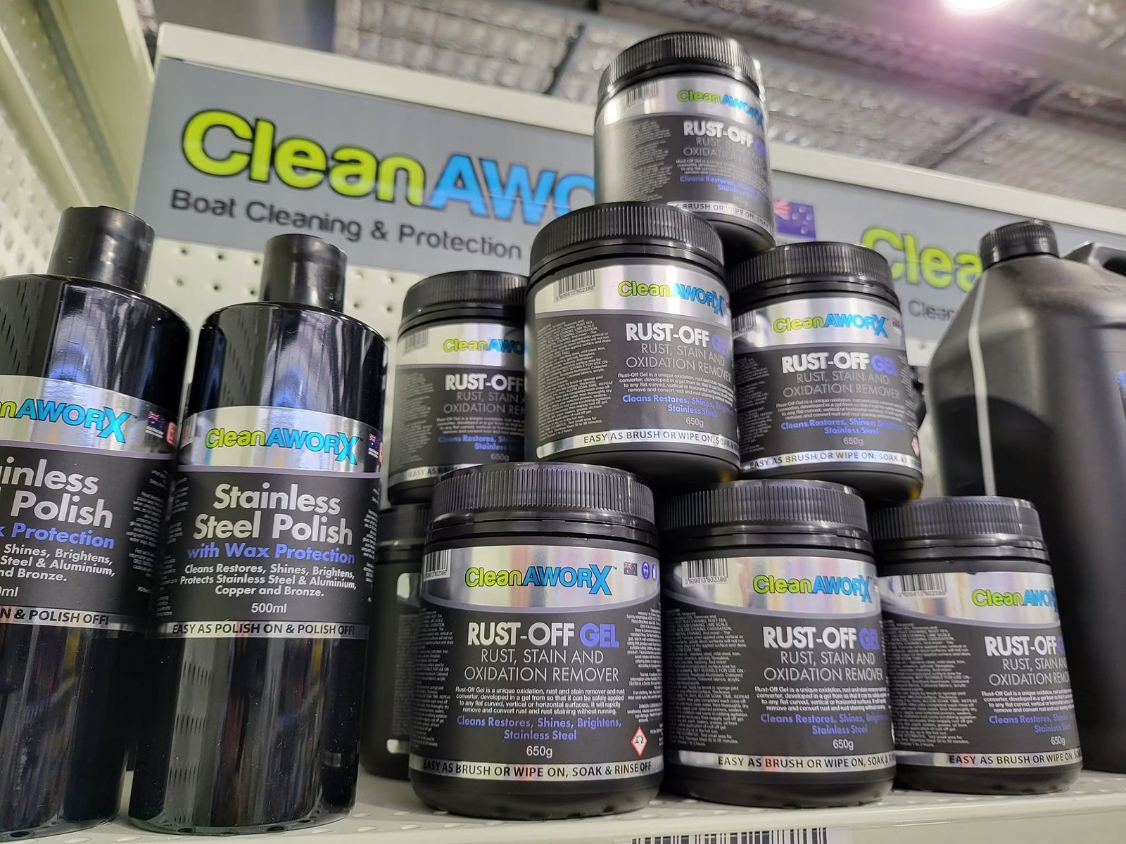 Stacked tubs of CleanAWORX Rust-Off Gel and Stainless Steel Polish on the shelf at Marine Trade Supplies, Coomera